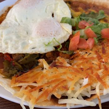 Hannah And Nate's - Huevos rancheros on flour tortilla with a side of carne adovada and green chile - Cafes Near Me - Corrales, New Mexico Hannah And Nate's - Huevos rancheros on flour tortilla with a side of carne adovada and green chile - Cafes Near Me - Corrales, New Mexico