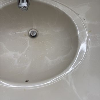 SkyLight Inn & Suites - Sink with cigarette burns - Hotels Near Me - Willoughby, Ohio