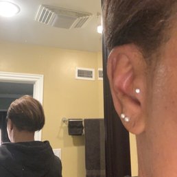 Tragus piercing Tragus piercing