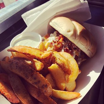 Prowl - Mate chicken burger with spicy fried pickles, buttermilk ranch, bacon & pimento cheese. Wedge fries! - Food Trucks Near Me Prowl - Mate chicken burger with spicy fried pickles, buttermilk ranch, bacon & pimento cheese. Wedge fries! - Food Trucks Near Me