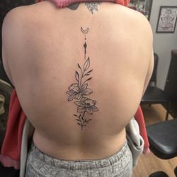 Pins & Needles Tattoo and Body Piercing Studio - Spine tattoo