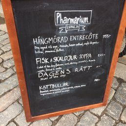 The sign in front of the restaurant indicating the daily specials. The meatballs were good, and the meal of the day (salmon) was a steal! The sign in front of the restaurant indicating the daily specials. The meatballs were good, and the meal of the day (salmon) was a steal!