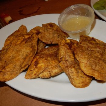 Pio Pio 2 - Tostones with a garlic lemon sauce - Latin American Near Me - Jackson Heights, New York