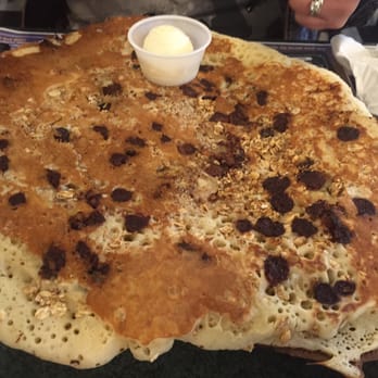 Metro Diner - The largest pancake I have ever seen. Loved the granola, nice touch! - Diners Near Me - Gainesville, Florida