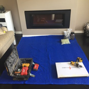 Greenforest Fireplace & Patio - We had to put down our own tarp to protect our floors or else they wld have scratched them up. Their equipment is heavy. - Fireplace Services Near Me - Chicago, Illinois