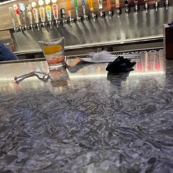 Blast & Brew - This was the previous customers drink and napkins that never got cleaned up. - New American Near Me - Pismo Beach, California