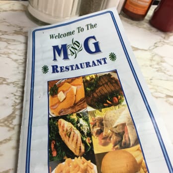 M&G Restaurant - a menu on a table - Coffee & Tea Near Me - Bronx, New York M&G Restaurant - a menu on a table - Coffee & Tea Near Me - Bronx, New York