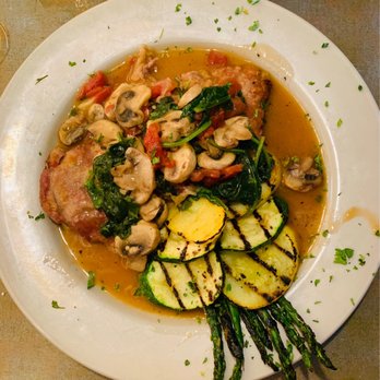 Bocaccini's - Veal Marsala - pan seared top round veal cutlet, baby spinach, roma tomatoes, button mushrooms, marsala wine - Italian Near Me - Fairport, New York Bocaccini's - Veal Marsala - pan seared top round veal cutlet, baby spinach, roma tomatoes, button mushrooms, marsala wine - Italian Near Me - Fairport, New York