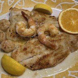 Continental Platter Broiled fresh scrod fillet, sea scallops, filet of flounder, and jumbo shrimp scampi.