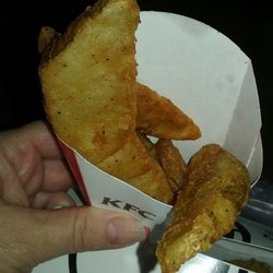 KFC - My oder of potato wedges, 2 wedges and some crumbs