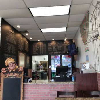 Daddyo's Pizza - menu on the wall - Pizza Near Me - Houston, Texas