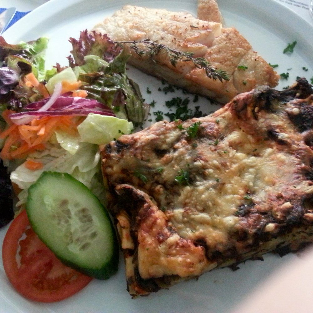 Der Fischladen - Fish with spinach lasagna and side salad - Seafood Near Me - Berlin, BE Der Fischladen - Fish with spinach lasagna and side salad - Seafood Near Me - Berlin, BE