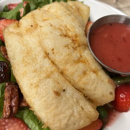 Tripletail their specialty this time on top of fresh greens salad. Tripletail their specialty this time on top of fresh greens salad.