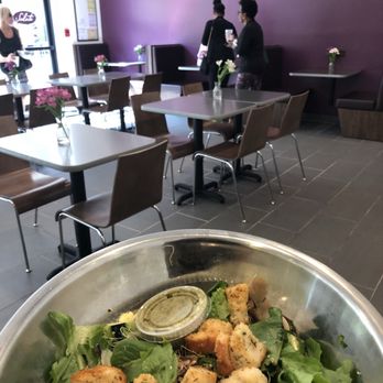 Salata - Cute little vases with fresh flowers are at each table - Salad Near Me - Atlanta, Georgia Salata - Cute little vases with fresh flowers are at each table - Salad Near Me - Atlanta, Georgia