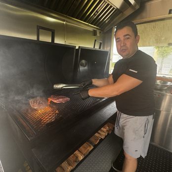 Coloyos Food And Grill - Vladimir making Picanha on the grill. - Food Trucks Near Me - Miami, Florida Coloyos Food And Grill - Vladimir making Picanha on the grill. - Food Trucks Near Me - Miami, Florida