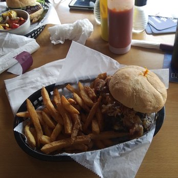 Finns Beachside Pub - Finns burger with fries - New American Near Me - Flagler Beach, Florida Finns Beachside Pub - Finns burger with fries - New American Near Me - Flagler Beach, Florida