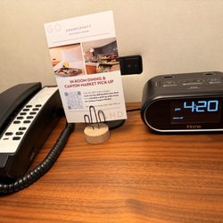 Grand Hyatt Scottsdale Resort - Room service info with phone and alarm clock