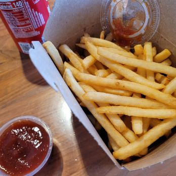 Primal Cuts - Side of fries, ketchup, and a can of Coke - Steakhouses Near Me - Stanton, California