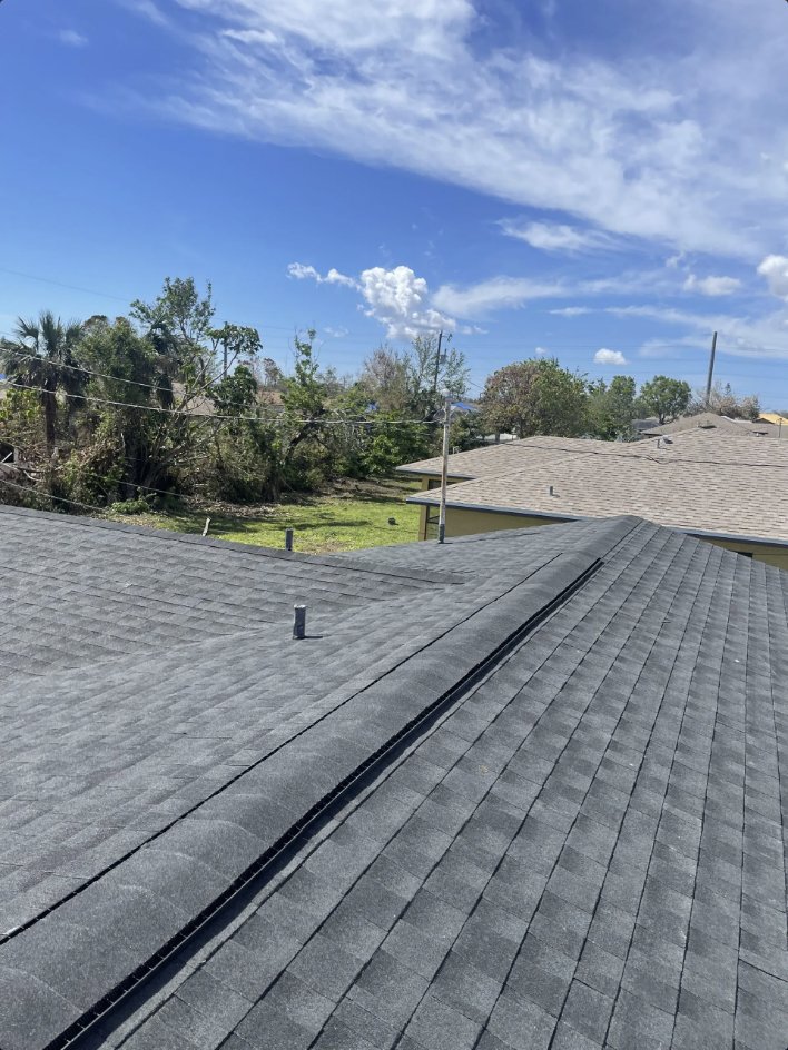 Slide of Reedy Roofing