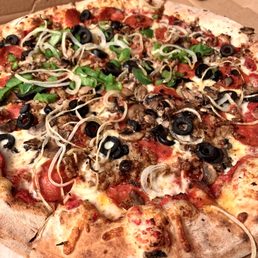 Large supreme with green peppers only on half. Large supreme with green peppers only on half.