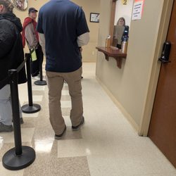 Bentonville Revenue Office - Driver's license photo line, you the left after the front entrance.