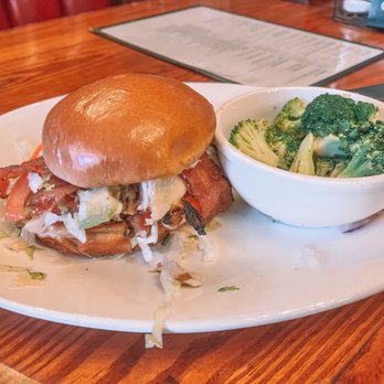 The District Tap - Left Coast Chicken Club Sandwich with a side of Steamed Broccoli - Sports Bars Near Me - Indianapolis, Indiana The District Tap - Left Coast Chicken Club Sandwich with a side of Steamed Broccoli - Sports Bars Near Me - Indianapolis, Indiana