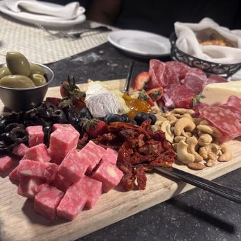 Cotton Calf Kitchen - Charcuterie board - New American Near Me - Braselton, Georgia Cotton Calf Kitchen - Charcuterie board - New American Near Me - Braselton, Georgia