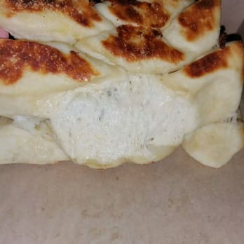 Donatos Pizza - The inside of the bread, completely raw dough. Unless you want food you can't eat, like this, do not eat here. - Pizza Near Me - Amelia, Ohio Donatos Pizza - The inside of the bread, completely raw dough. Unless you want food you can't eat, like this, do not eat here. - Pizza Near Me - Amelia, Ohio