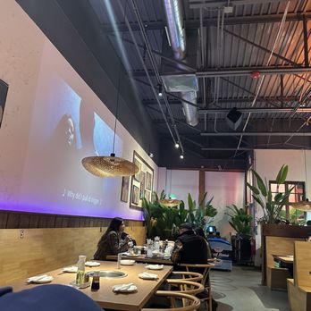Back Street Bbq & Sushi - Interior showing high ceilings and openness and video projection walls. - Barbeque Near Me - Hanover Park, Illinois