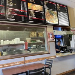 Art Alkobar Grill - Menu and food prep area