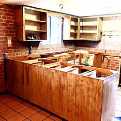 Casual Coif - Seven Sisters Salon - Sanding these kitchen cabinets to prep for the new finish