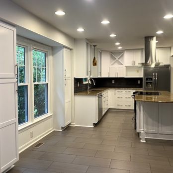 Fugon Contracting - This are the cabinets after painting was done. - Painters Near Me