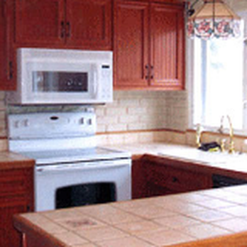 A & A Cabinets - a kitchen with white appliances - Cabinetry Near Me - Toms River, New Jersey A & A Cabinets - a kitchen with white appliances - Cabinetry Near Me - Toms River, New Jersey