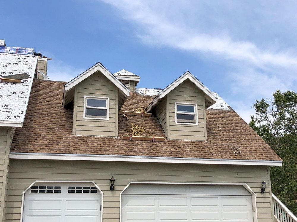 Slide of Sandoval Roofing