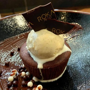 Roka Akor - Oak Brook - Molten chocolate lava cake with vanilla ice cream. The personalized chocolate shard is a nice touch! - Japanese Near Me - Oak Brook, Illinois Roka Akor - Oak Brook - Molten chocolate lava cake with vanilla ice cream. The personalized chocolate shard is a nice touch! - Japanese Near Me - Oak Brook, Illinois
