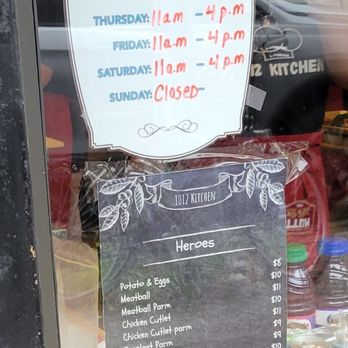 1012 Kitchen - a sign in the window of a business - Sandwiches Near Me - Brooklyn, New York 1012 Kitchen - a sign in the window of a business - Sandwiches Near Me - Brooklyn, New York