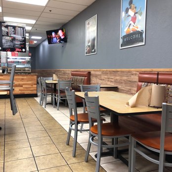 O Town - tables and chairs - Chicken Wings Near Me - Orlando, Florida O Town - tables and chairs - Chicken Wings Near Me - Orlando, Florida