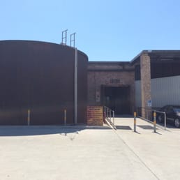 The entrance is from the large parking lot behind the Bunnings.