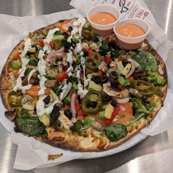 MOD Pizza - MOD-size thin crust pizza with ranch drizzle and two cups of sri-rancha - Pizza Near Me - Irvine, California