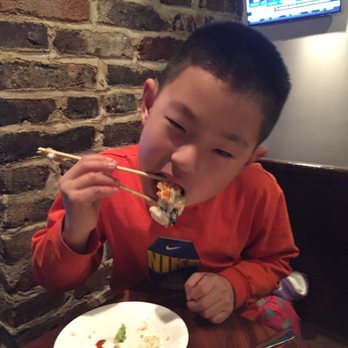Buddha Lounge - Drew was totally getting in to crunchy roll. - Sushi Bars Near Me - Lexington, Kentucky