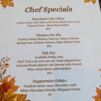 Reserve 22 - A menu from Reserve 22 displays chef specials including Maryland Crab Cakes, Chicken Pot Pie, Fish Fry, and Peppermint Gelato. The menu features decorative autumn leaves in the corners, with detailed descriptions and prices for each dish. The Fish Fry is noted as available only on Fridays, and the Peppermint Gelato includes crushed candy cane and chocolate curls. - Venues & Event Spaces Near Me - Glen Ellyn, Illinois