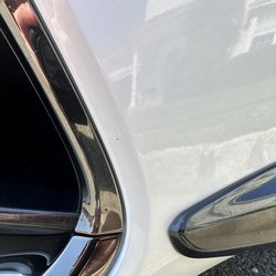 Pride Paint & Bodywerks - Dirt nail and crater mark. This area was worst, but THEY polished it down to try to hide it.