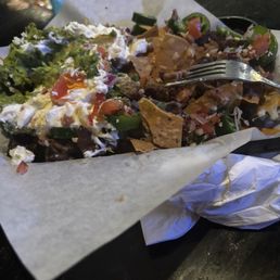 Their Cana asada nachos