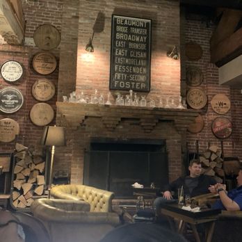 Multnomah Whiskey Library - Fireplace wall. - Lounges Near Me - Portland, Oregon Multnomah Whiskey Library - Fireplace wall. - Lounges Near Me - Portland, Oregon