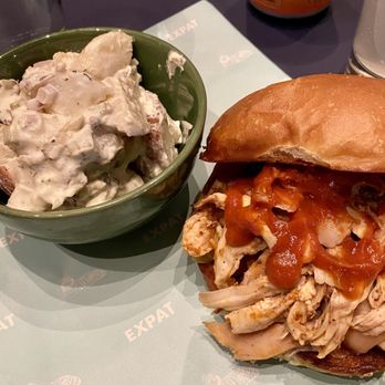 Expat BBQ - Pulled chicken sandwich and potato salad - Bars Near Me - Saint Louis, Missouri Expat BBQ - Pulled chicken sandwich and potato salad - Bars Near Me - Saint Louis, Missouri
