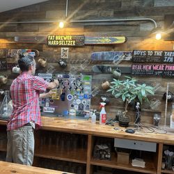 Bear Belly Brewing Company - Bar with beer menu and taps