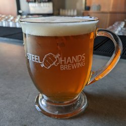 Steel Hands Brewing - Coffee lager in a glass coffee mug. Fantastic!