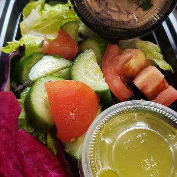 Kababstic Mediterranean Grill - Salad with lemon pepper dressing and hummus so you can see it - Mediterranean Near Me - Arcadia, California Kababstic Mediterranean Grill - Salad with lemon pepper dressing and hummus so you can see it - Mediterranean Near Me - Arcadia, California