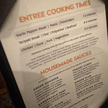The Melting Pot - Standee on the table with cook times and descriptions of the sauces that come - Fondue Near Me - Orlando, Florida The Melting Pot - Standee on the table with cook times and descriptions of the sauces that come - Fondue Near Me - Orlando, Florida