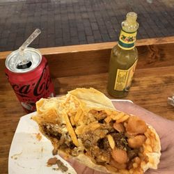 El Jefe's Taqueria - Steak burrito with yellow rice pinto beans shredded cheese and sour cream